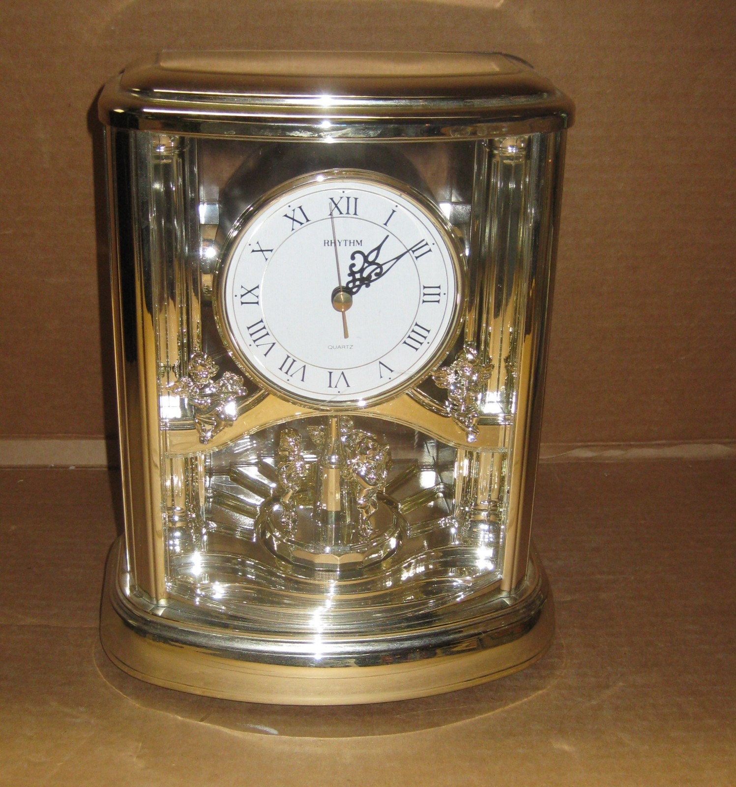 10 1 / 2 " RHYTHM ROTATING ANGEL MANTLE CLOCK QUARTZ Plays "FUR ELISE" Japan photo 10 1 / 2 " RHYTHM ROTATING ANGEL MANTLE CLOCK QUARTZ Plays "FUR ELISE" Japan photo
