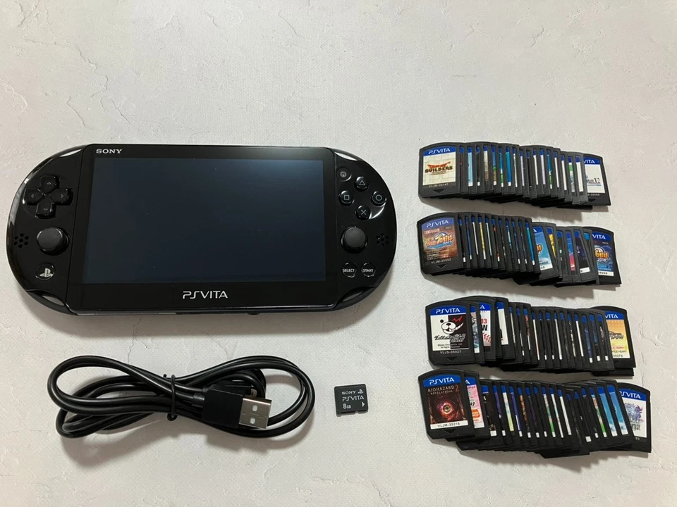 Sony PS Vita PCH-2000 Console with charger / Memory card random 2 games from US - Image 2 of 4