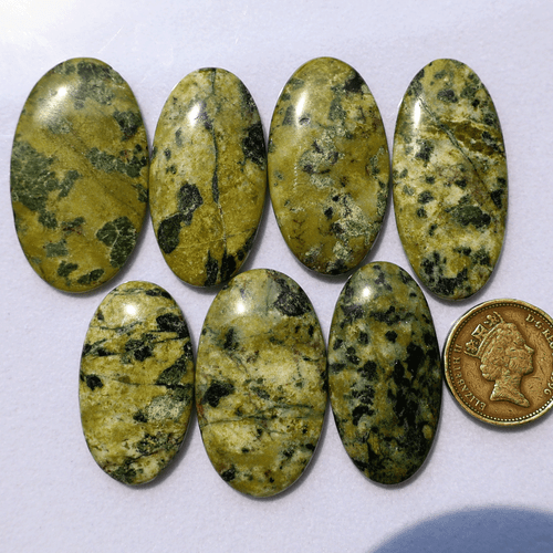 Venta al por mayor Lote de 7 piedras preciosas cabujón ovalado serpentina natural sin tratar 36-44 mm - Imagen 7 de 11