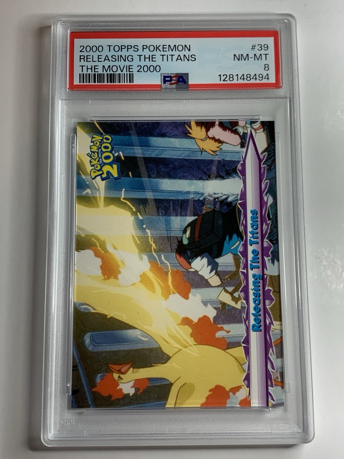 Topps Pokemon the Movie 2000 #39 Releasing The Titans PSA 8 NM-MT