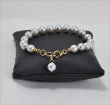 BRACCIALE IN ORO GIALLO 18 KT CON PERLE AKOYA GRIGIE OGRP 063