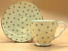 Wedgwood The Harlequin Collection Yellow Polka Dot demitasse cup & saucer duo.