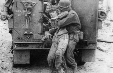 WW2 Picture Photo France 1944 US Soldier picks up a wounded German soldier 3290