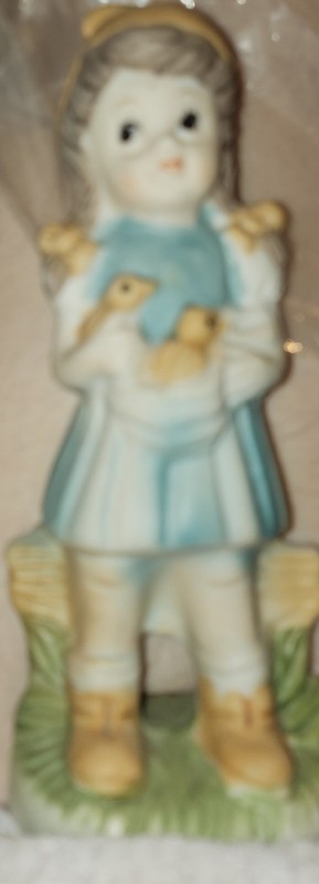 Vintage Ceramic Figurine of Girl Holding Chick's In Bonnet Made In Japan