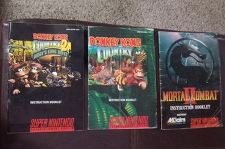 Lot Super Nintendo Inst Manuals Promo Poster Donkey Kong Country Mortal Kombat 2