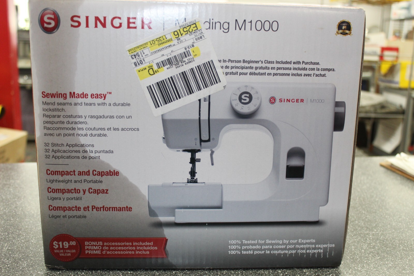 Singer M1000 Sewing Machine with 32 Stitch Applications and Accessories