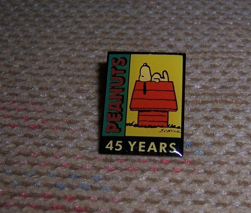 Snoopy on Doghouse Lapel Pin "45 Years" with "PEANUTS" on side Collectible Pin
