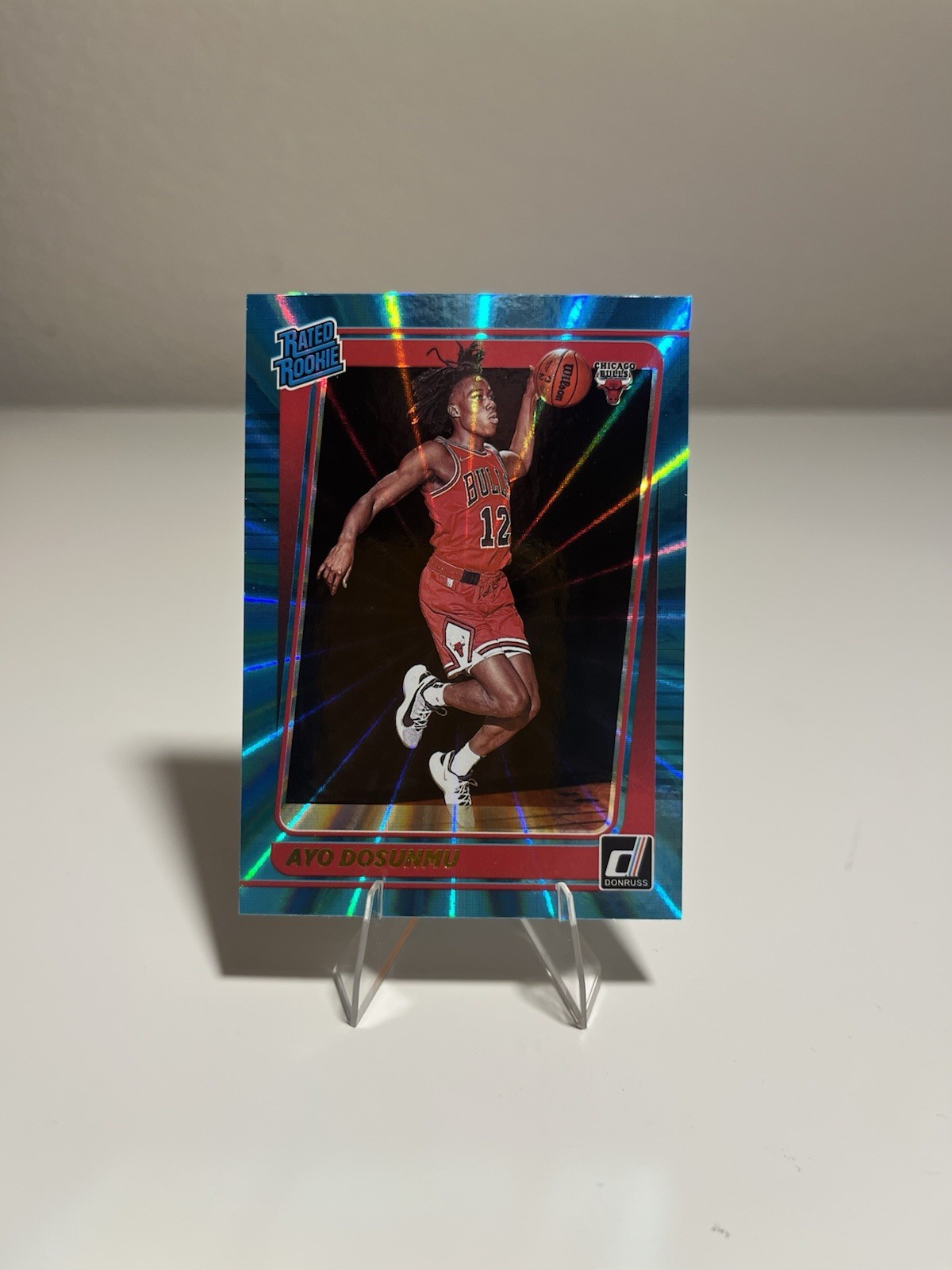 2021-22 Donruss #221 Ayo Dosunmu Holo Teal Laser Rated Rookie E1