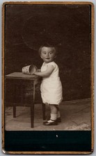 Antique CDV Circa 1880s Cute Child In Dress Unmarked
