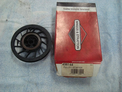 #ad Briggs and Stratton 498144 starter pulley with spring NOS $9.95