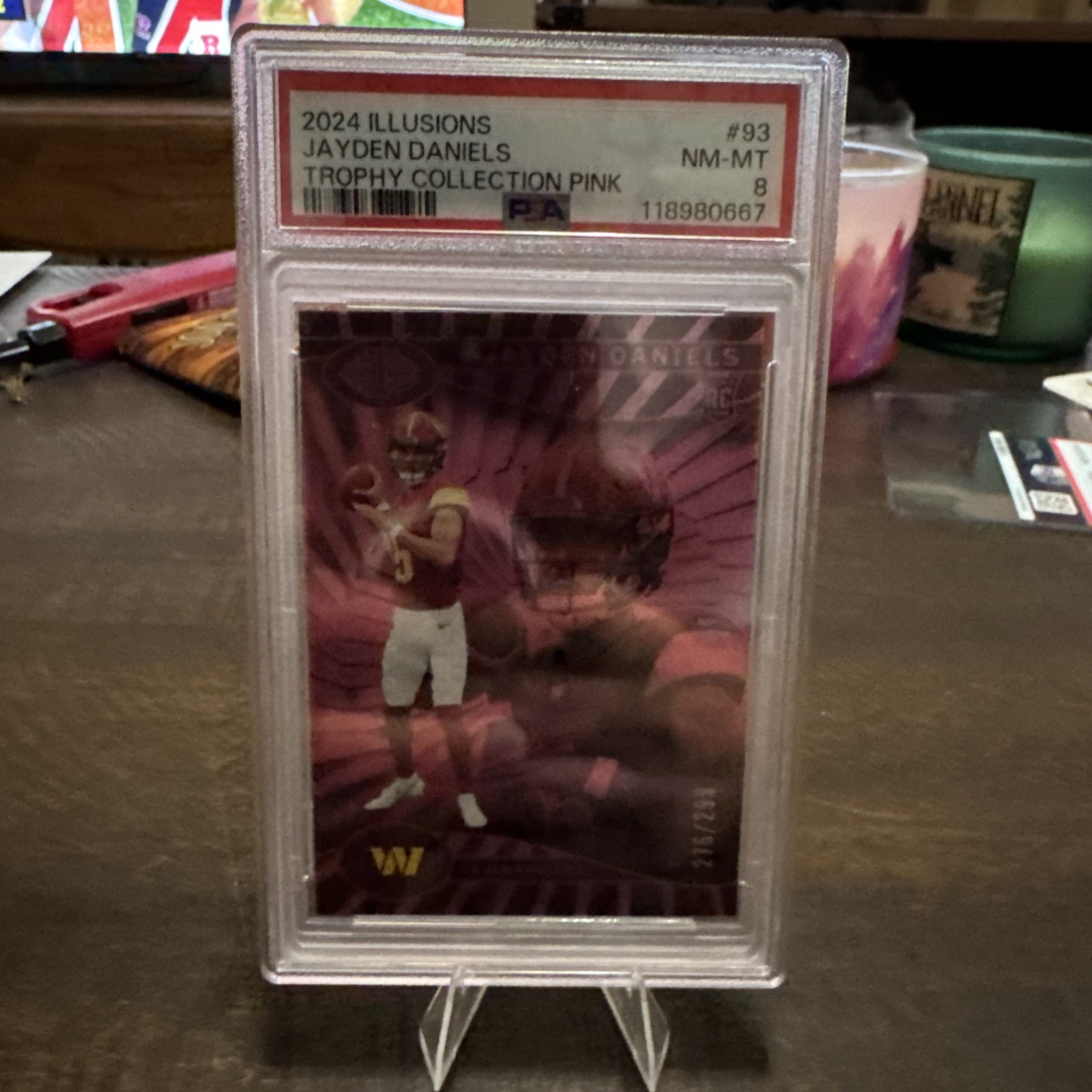 JAYDEN DANIELS 2024 PANINI ILLUSIONS TROPHY COLLECTION PINK #93 RC /299 PSA 9