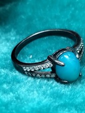 Blue/turquoise natural Ethiopian welo opal oxidised sterling silver ring size R.
