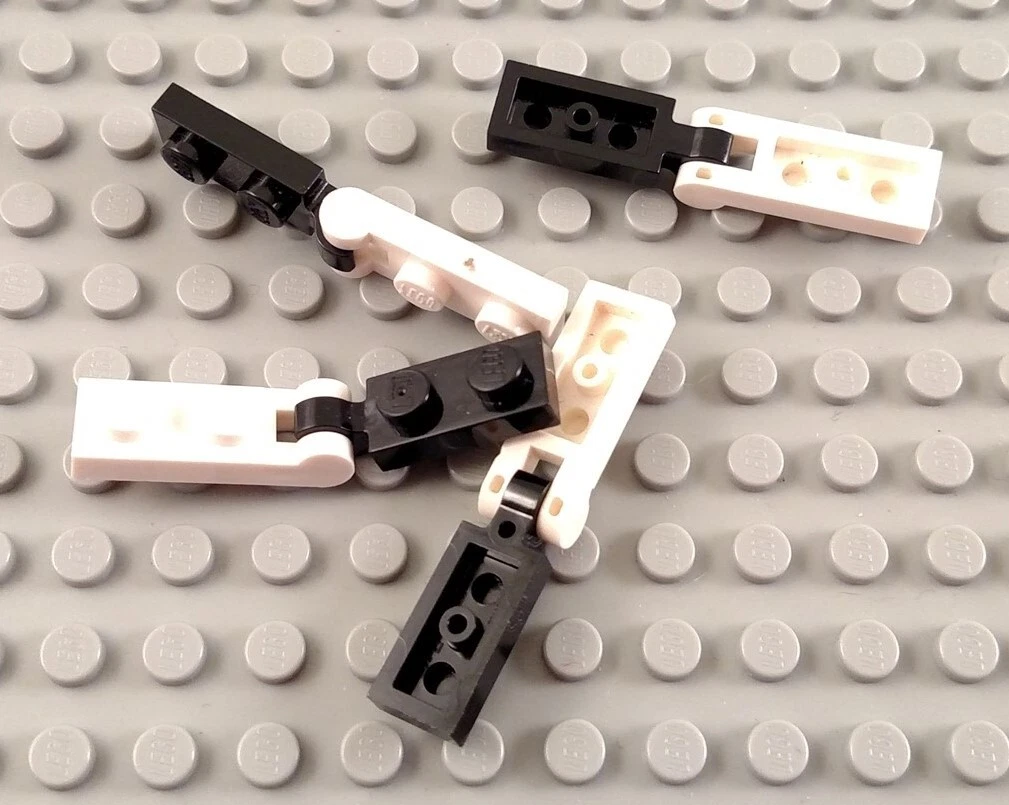 LEGO Lot of 4 Black and White 1x2 Clip and Bar Hinge Style Plate Pieces