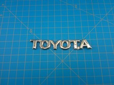 Toyota Vintage Chrome Emblem Badge 447-a60026 Oem Script Logo Classic Japan Toyota Vintage Chrome Emblem Badge 447-a60026 Oem Script Logo Classic Japan