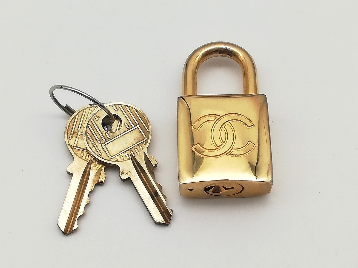 CHANEL Gold Padlock Key Clochette Charm