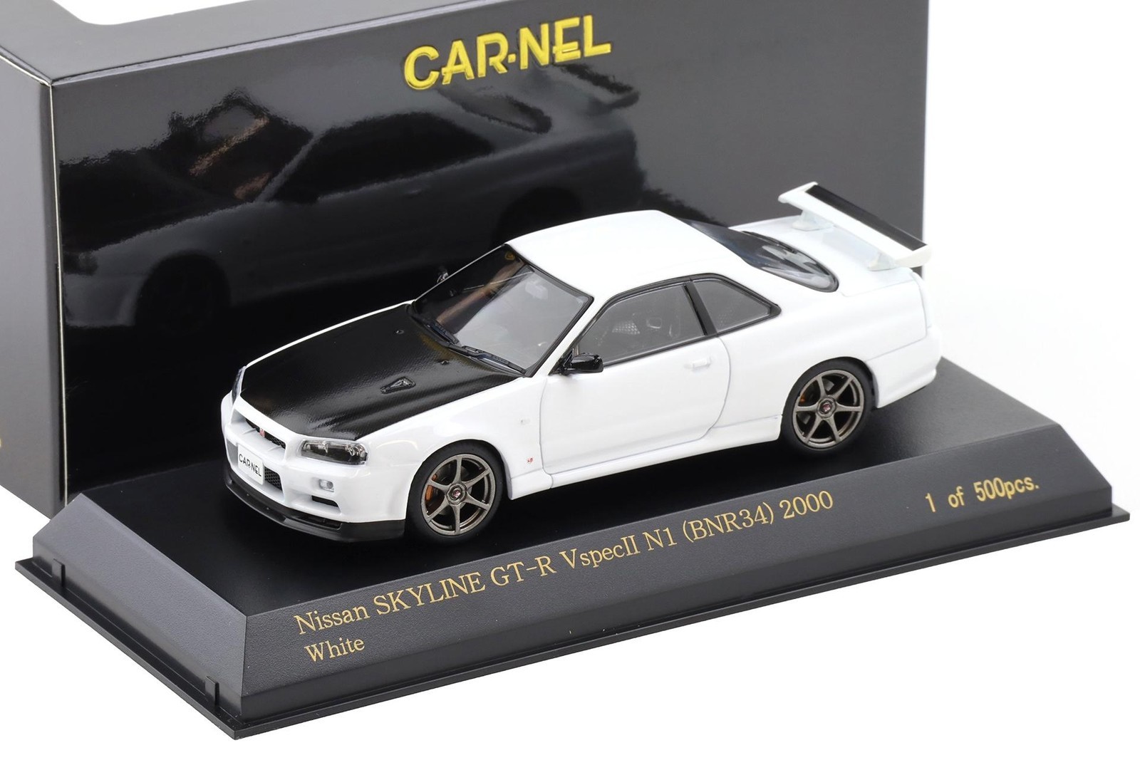 1:43 CAR-NEL by Kyosho Nissan Skyline GT-R R34 V-SPEC N1 2000 White/Carbon