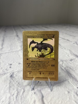 Ultra Rare Shining Charizard 1st Edition 107/105 Gold Foil Pokemon Card