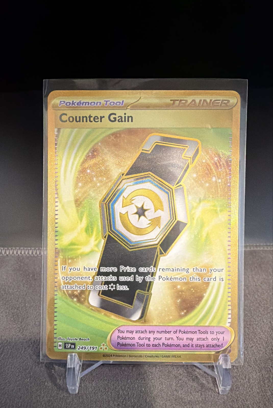 Counter Gain 249/191 Sv08: Surging Sparks Holo Rare Pokemon M/NM