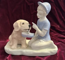 Boy With Golden Retriever Puppy Figurine