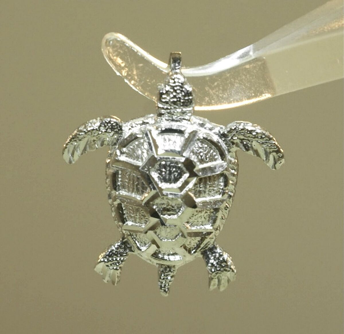 14k Gold with D/C White Rhodium Floral Sea Turtle Pendant 14k Gold with D/C White Rhodium Floral Sea Turtle Pendant
