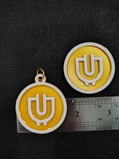Useless Coin. Virtual plastic Useless crypto coin. Receive Two Coins.