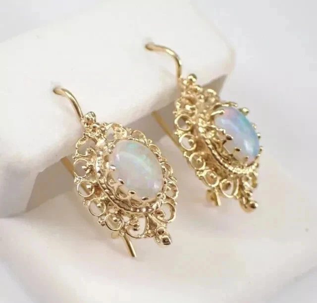 Pendientes colgantes vintage de ópalo de fuego natural de 3 quilates de corte ovalado enchapados en oro amarillo de 14 quilates Foto 4 de 4