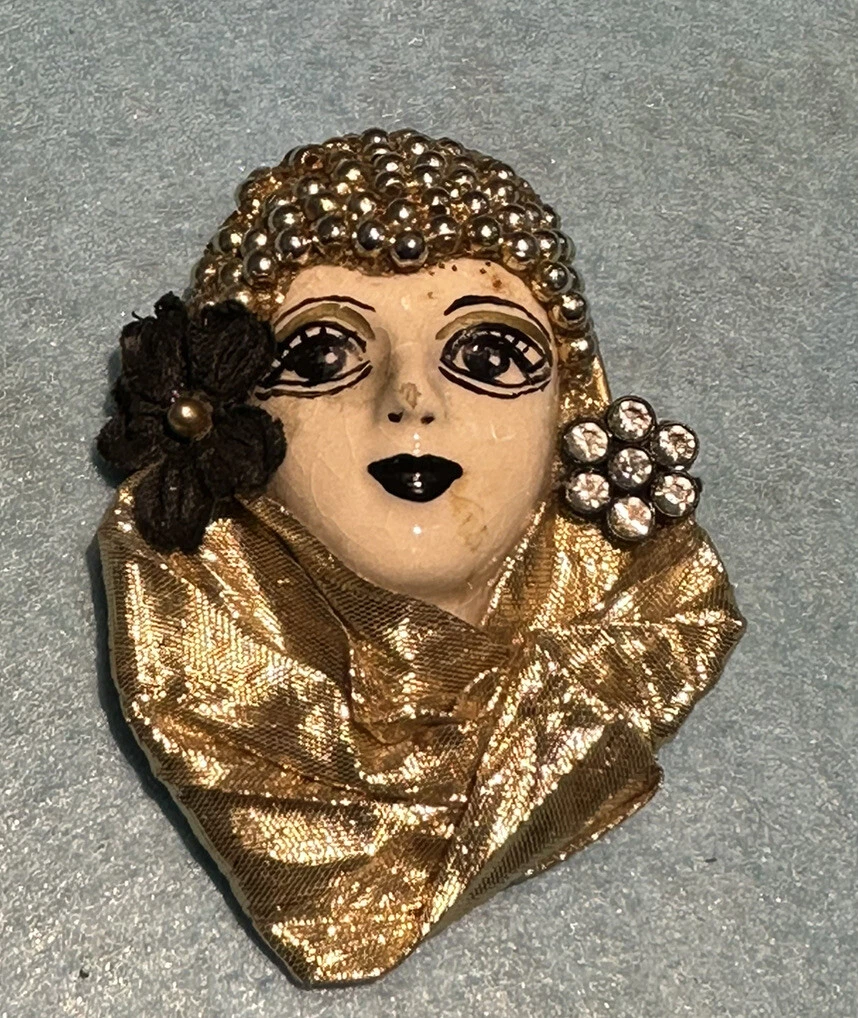 Lady head hotsell face brooch