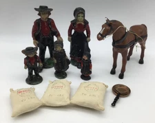 Amish Family Cast Iron Figures - Horse - Pan Set & Flour Sacks 12 Pieces