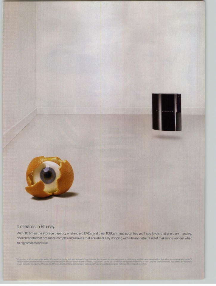 A 2006 PS3 launch-era print ad featuring genuinely creepy eyeball art — a cool slice of gaming history that doubles as striking retro tech wall decor.
