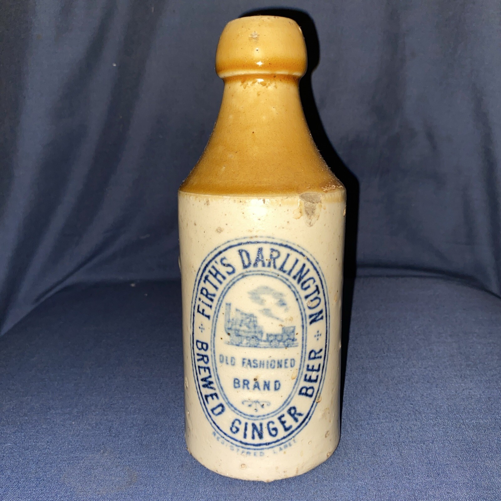 Antique Firths Darlington Stoneware Ginger Beer Bottle with Stephensons Rocket Design