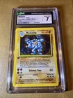 Pokémon Machamp Base Set 1st Edition Holo 8/102 CGC 7 NM