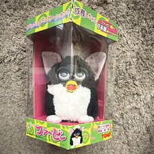 vintage 1998 Tiger Electronics Furby in black and white with blue eyes Japanese