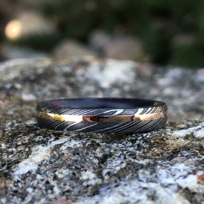 Damascus Steel Wedding Band With Purple Rain Sleeve And 14k Off-Center Rose Gold