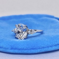 Oval Cut 3 Stone 3 CTW Simulated Diamond Engagement Ring 925 Sterling Silver