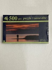 500 pcs puzzle 18.25    11". Age 12 