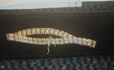 9ct. hallmarked 375, gold  and  diamond  2 ct, tennis bracelet used