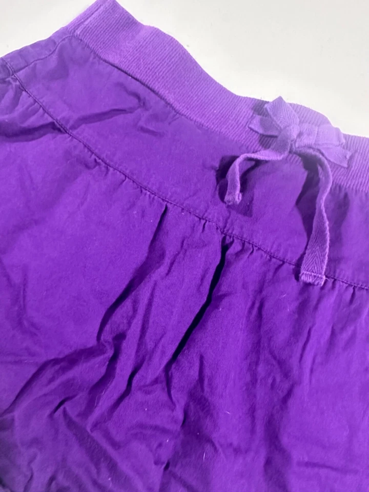Falda corta descolorida Glory púrpura lisa talla niña 10/12 L grande usada en excelente estado Foto 4 de 4