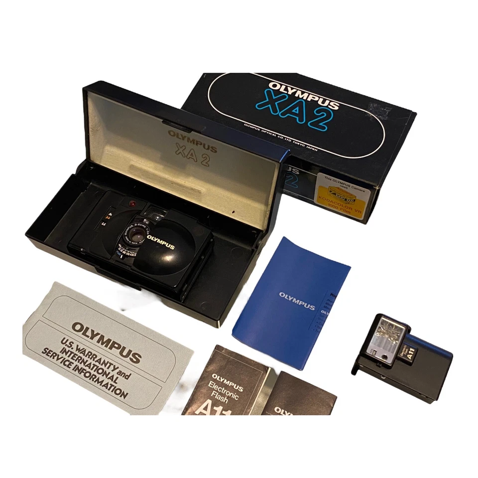 Olympus XA2 35mm Rangefinder Film Camera with A11 Flash Box Paperwork Untested - Image 2 of 4