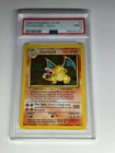 1999 Pokemon Game Charizard Holo 4/102 Graded PSA 9