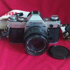 Canon AE-1 35mm SLR + original 50mm lens - Fully tested *WORKING*