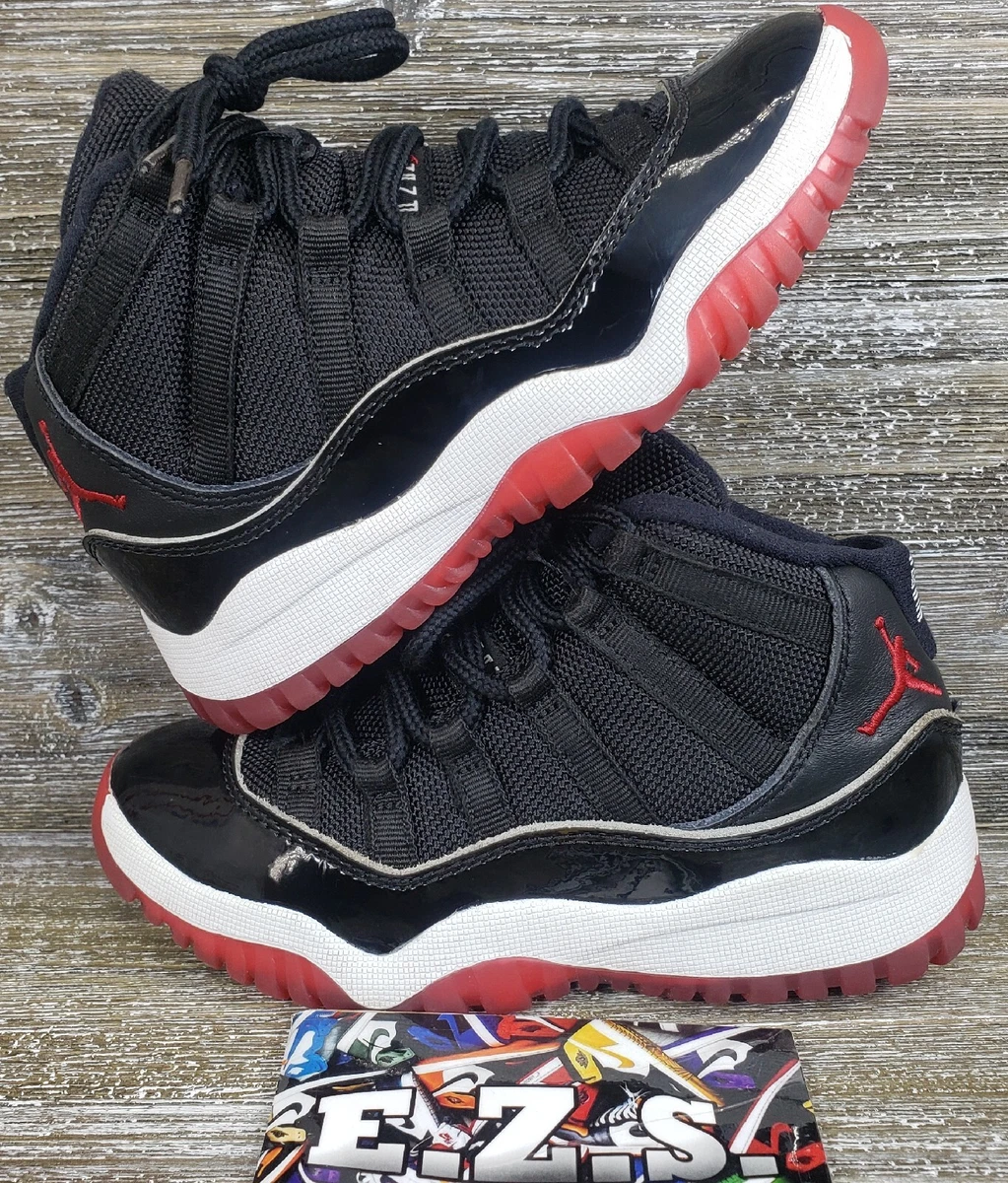 Red jordan shop 11 kids