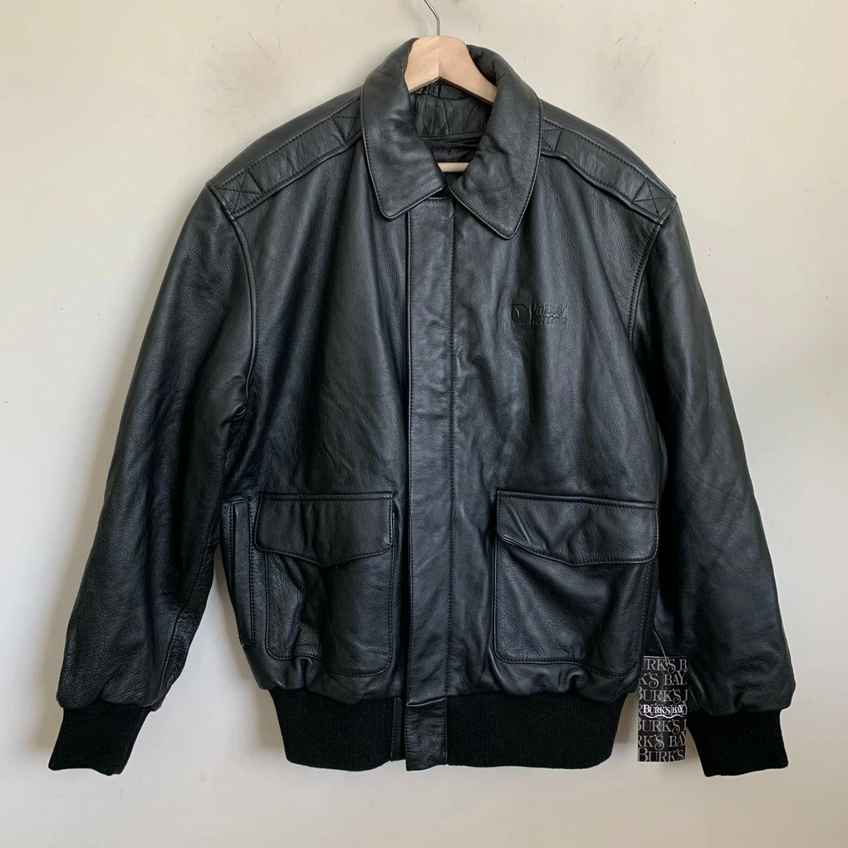Leather bomber jacket top with zip out lining