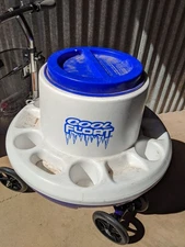 Cool Float" floating cooler, specifically a blue, round plastic cooler