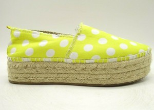 yellow and white polka dot shoes