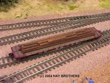 Carga de vigas de acero Hay Brothers - Se adapta a vagones planos y góndolas de 50/50+ pies