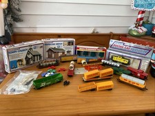 A lot of HO scale cats and buildings