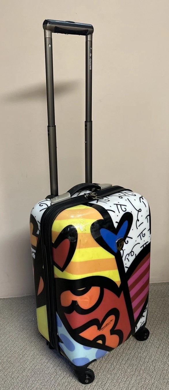 Heys A New Day 21" Transparent Carry On Luggage Spinner Romero Britto Hard Shell