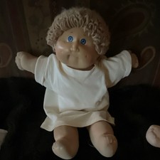 Cloth Baby Doll Soft Body Curly Blonde Hair Light Complexion White Dress