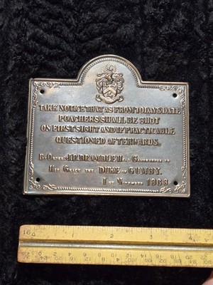 ''Poachers Shall Be Shot'' brass plaque