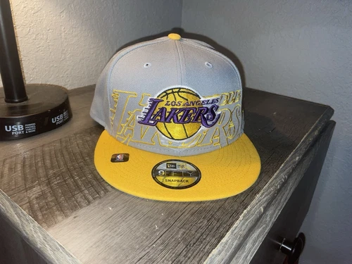 Los Angeles Lakers 2023 Alternate NBA Draft Grey-gold Fitted Hat By New Era.